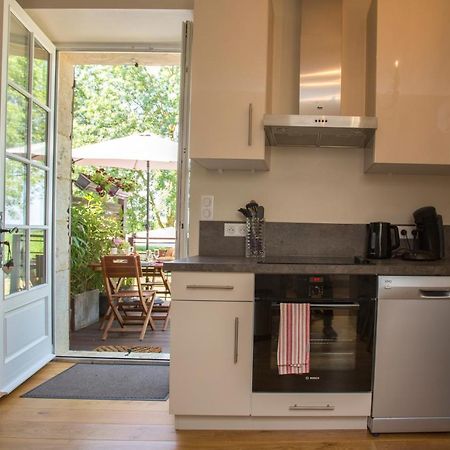 Les Hauts De Condom Appartements Climatises Bagian luar foto