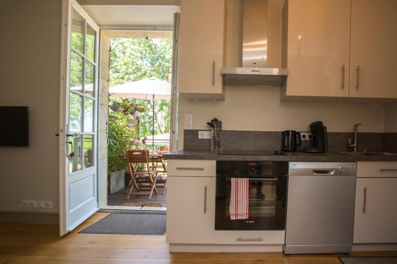 Les Hauts De Condom Appartements Climatises Bagian luar foto